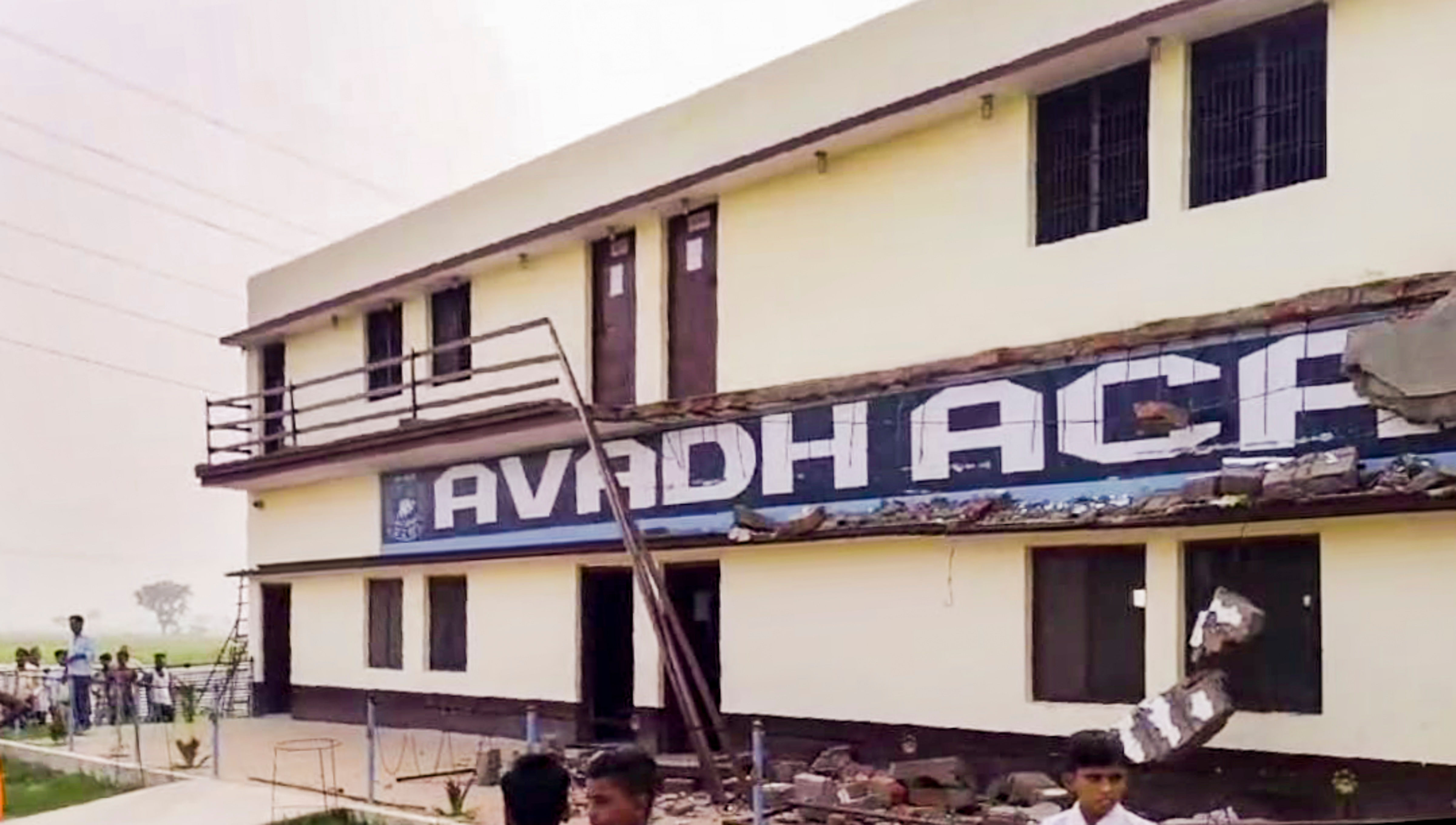 <div class="paragraphs"><p>People look at the collapsed balcony of a private school, in Barabanki, Friday.&nbsp;</p></div>